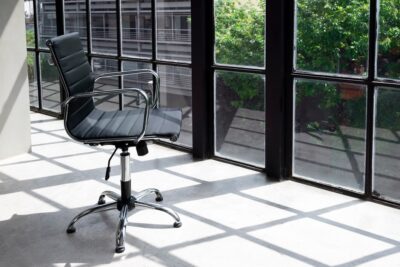 An empty office chair with wheels