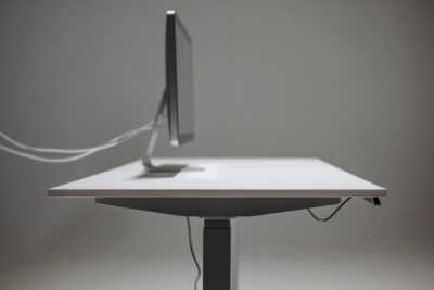 solid, adjustable desk ensures it stays secure whenever you raise or lower i