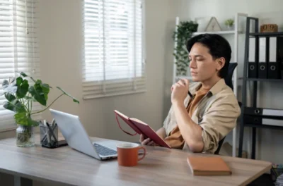 ergo chair, Thinking man sitting on an ergonomic office mesh chair